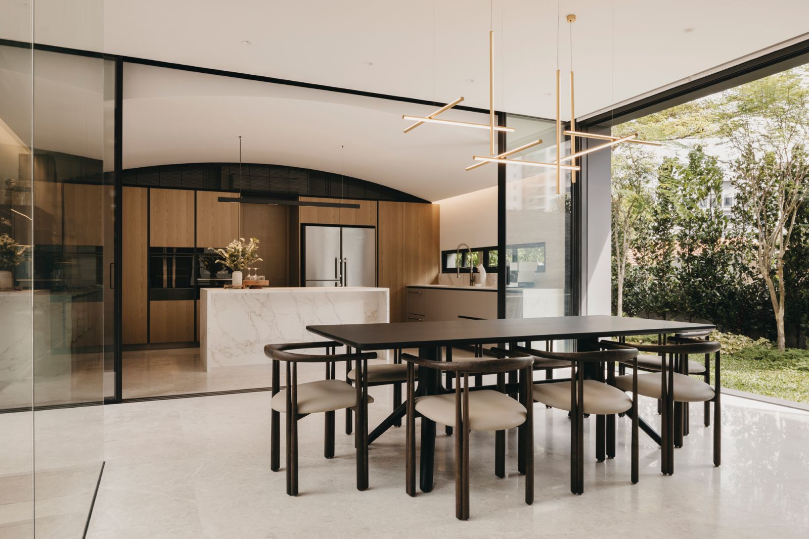 A baroque-inspired vaulted ceiling graces the younger son’s kitchen in this multigenerational home