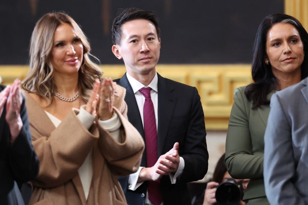 WASHINGTON, DC - JANUARY 20: TikTok CEO Shou Zi Chew and Tulsi Gabbard attend inauguration ceremonies in the U.S. Capitol Rotunda on January 20, 2025 in Washington, DC. Donald Trump takes office for his second term as the 47th president of the United States. (Photo by Kevin Lamarque - Pool/Getty Images)